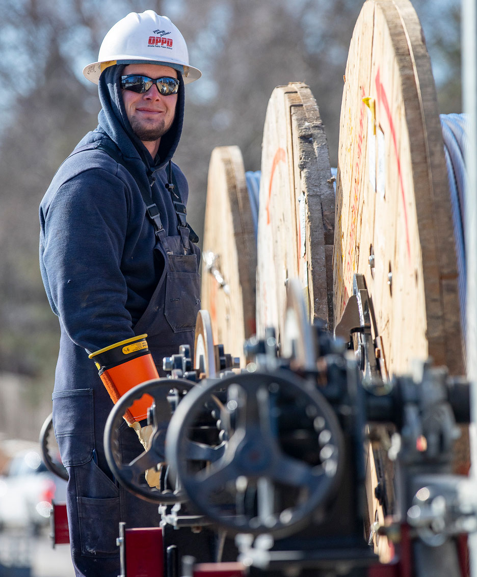 Worker working on a power pole